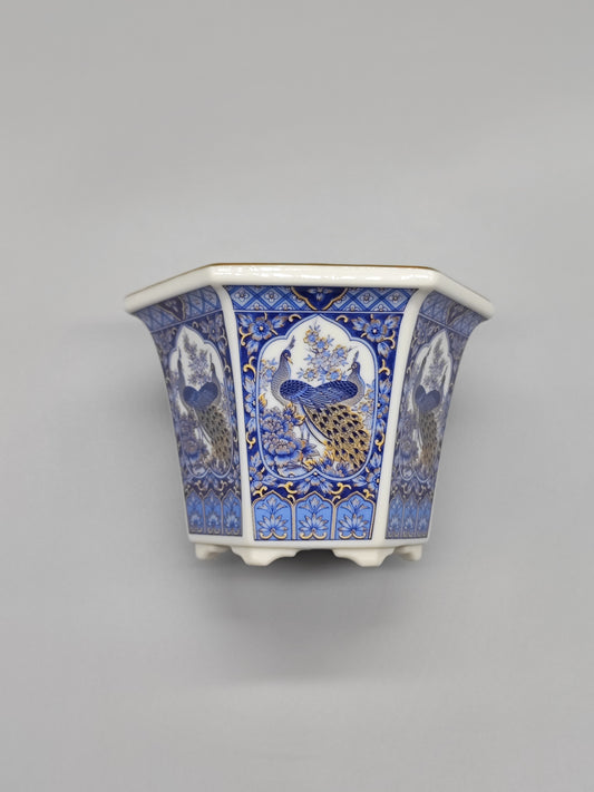 Blumentopf mit blauer Emaille