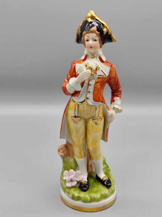 Antike Porzellanstatue des Rosenkönigs, gelber Arm, rote Jacke, gelbe Hose